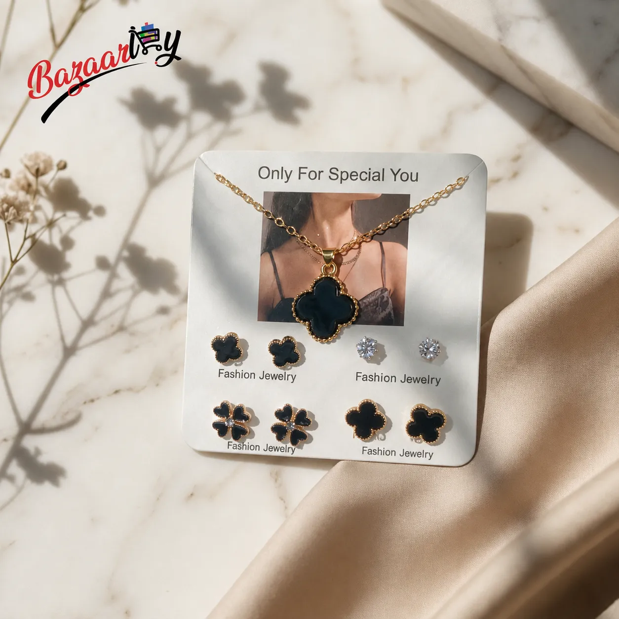 Elegant Black Clover Jewelry Set for Women – Gold-Tone Necklace & Stylish Earrings